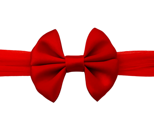 Red bow tie on a white background