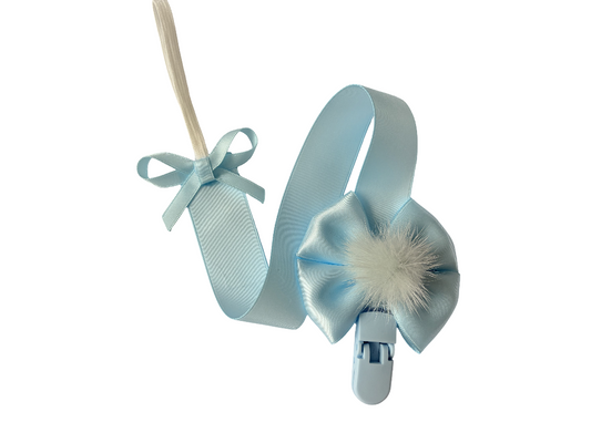 Light blue headband with bow and white fluffy center on a white background