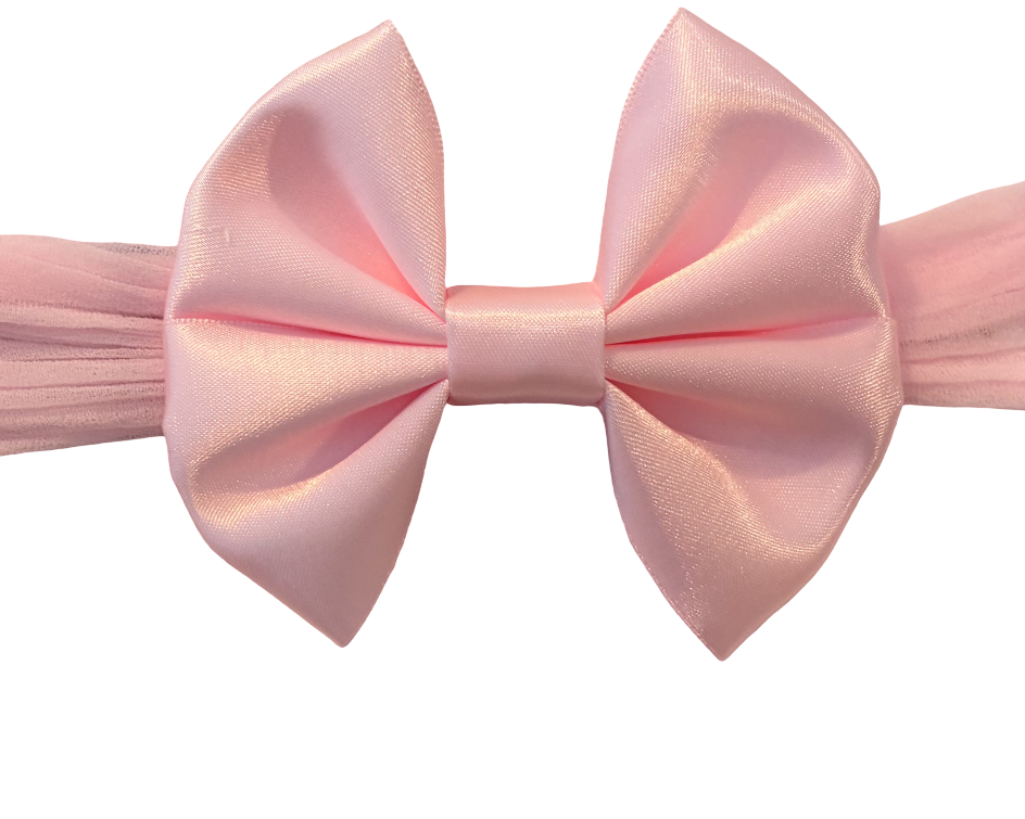 A light pink satin bow tie with matching pink pleated elastic bands on each side, shown against a plain white background.