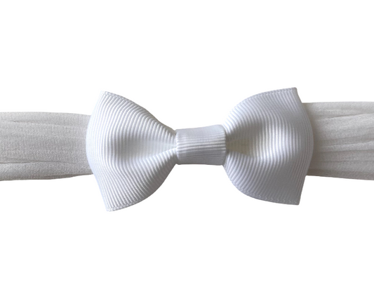 White bow tie on a white background