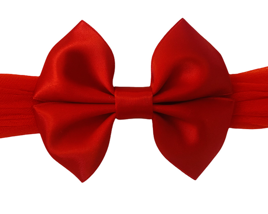 Red bow tie on a white background