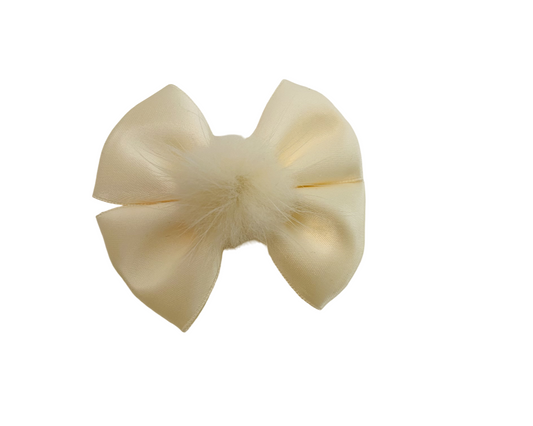 Beige bow on a white background