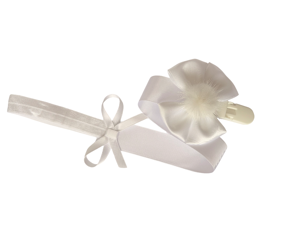 White headband with a bow and matching hair clip on a white background