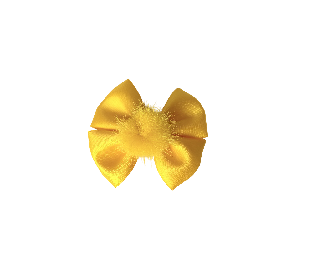 Yellow bow with feathers on a white background